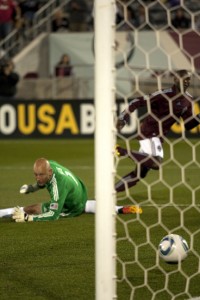 Rapids forward Omar Cummings rockets the ball past Revolution goalie Matt Reis for Colorado's first goal in a 3-0 rout on Saturday night. (Photo by Jessica Taves/ColoradoSoccerNow.com.)